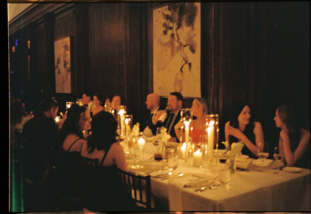 candid photo of guests sitting and chatting at a nashville wedding