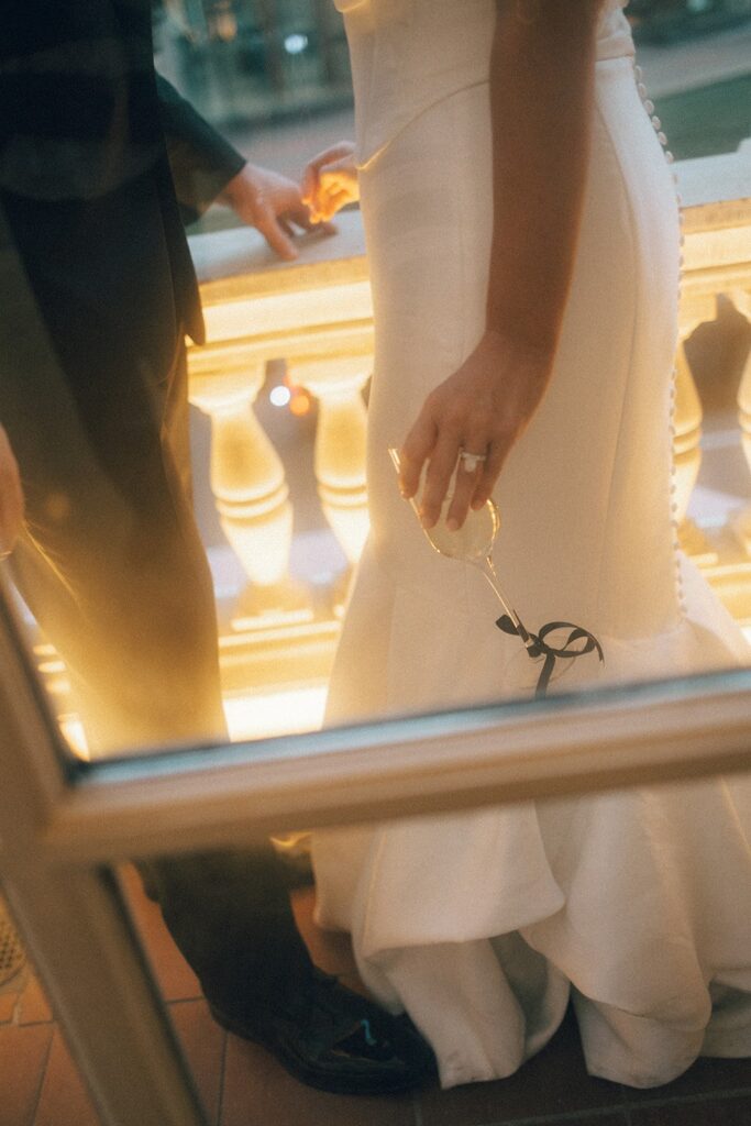 candid photo of a bride and groom, lower-body only, at their nashville wedding venue