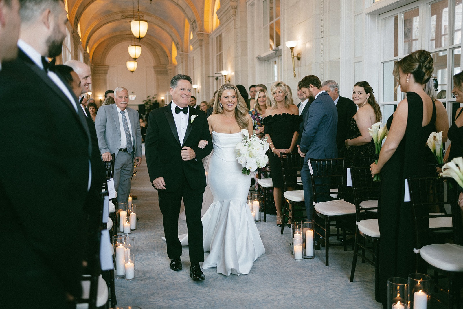 bride and groom walking down the aisle after months of nashville wedding planning