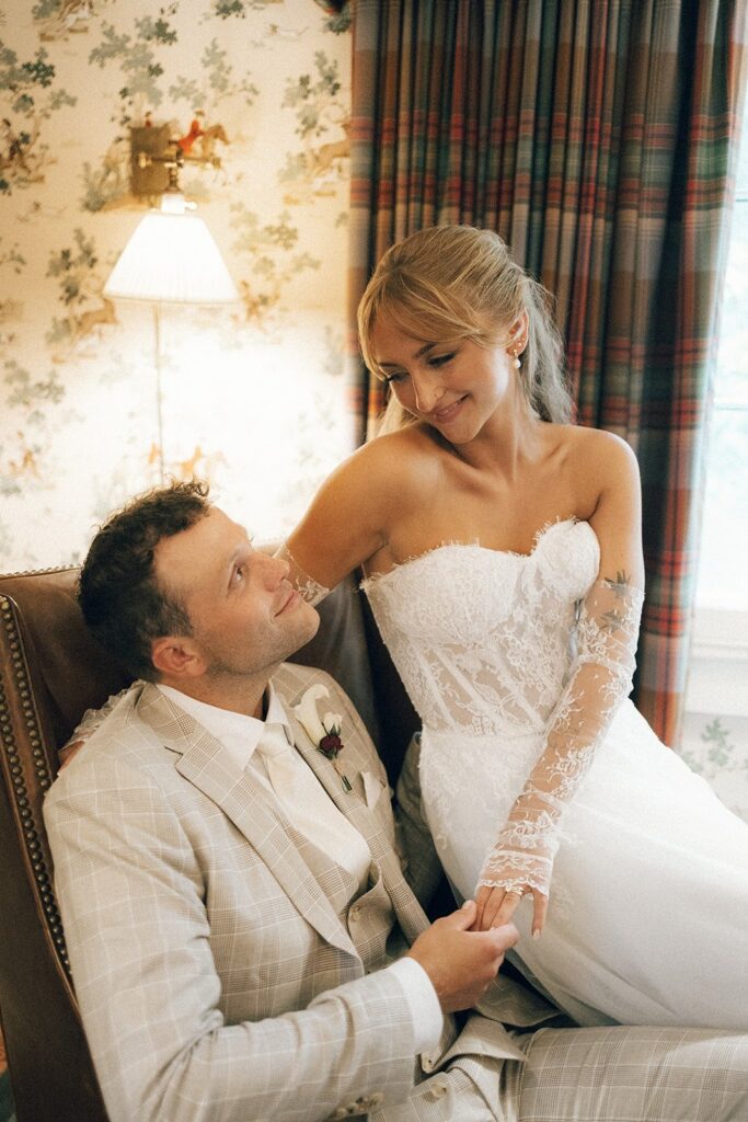 romantic portrait by one of the top nashville wedding photographers featuring a bride and groom in an elegant indoor setting in nashville tn