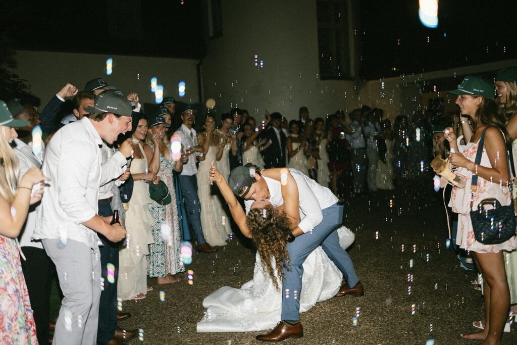 energetic wedding reception dance floor moment captured by one of the top nashville wedding photographers with guests celebrating around the couple