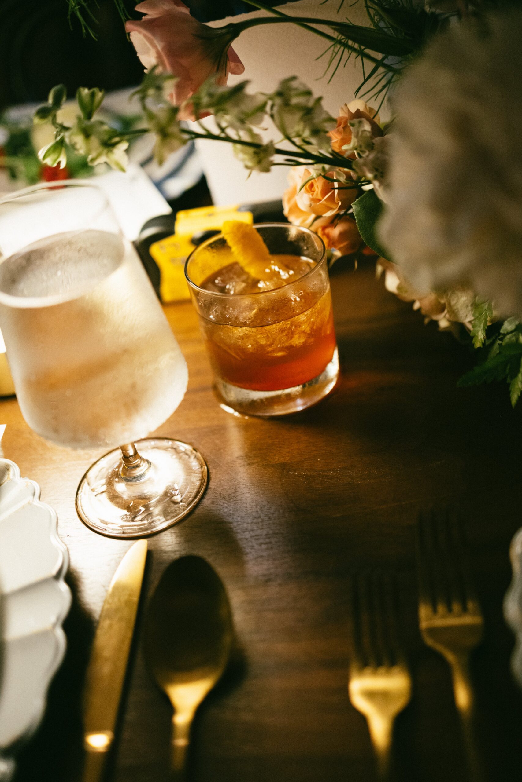 Close-up of signature cocktails and table florals at a romantic reception in a small wedding venue in Nashville TN.