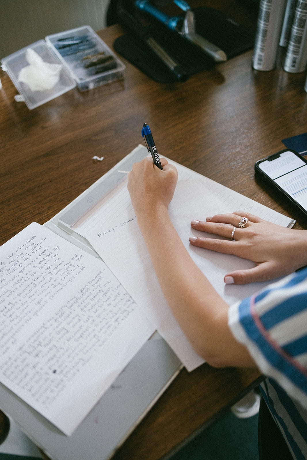 bride writing her vows before her estelle nashville wedding