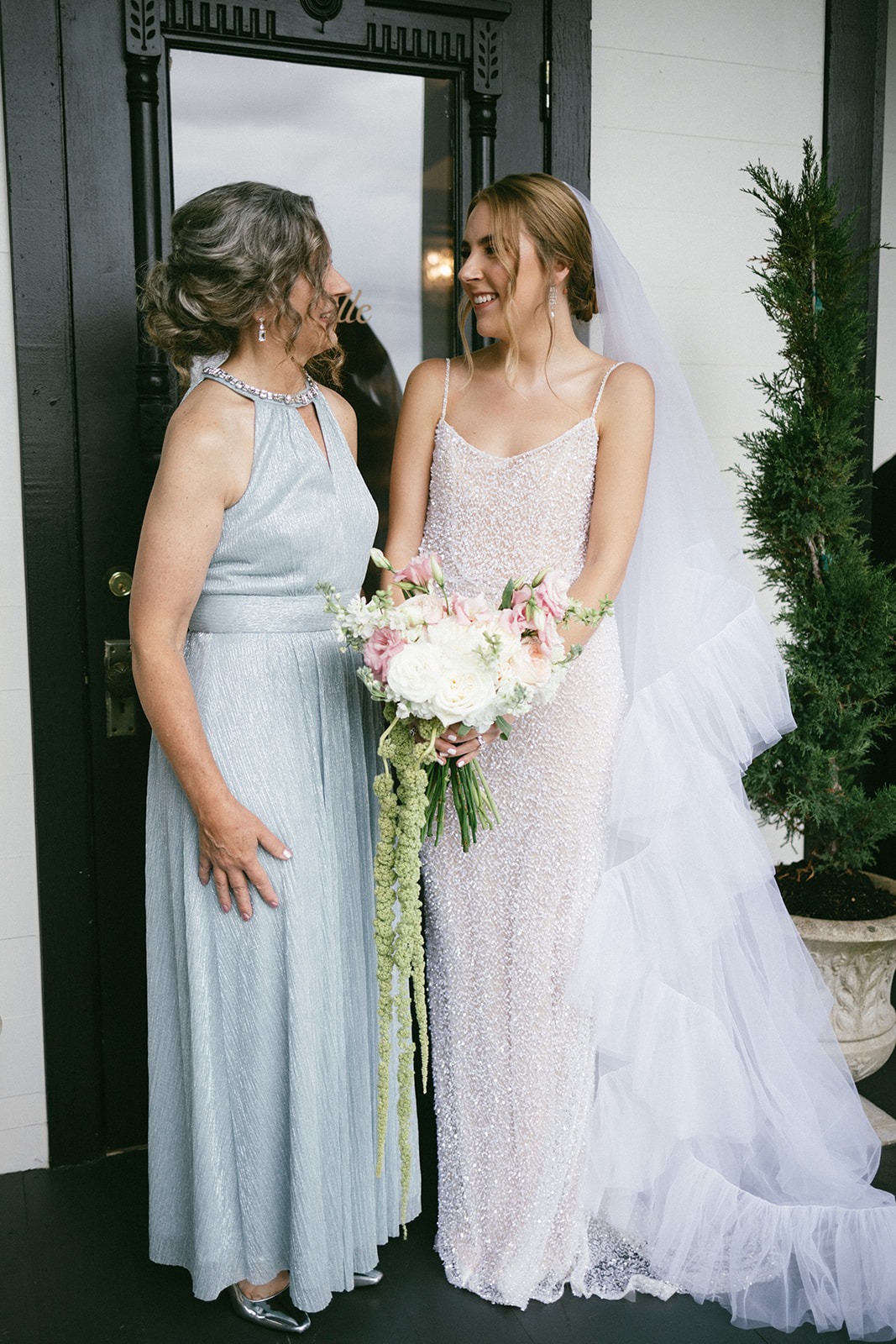 bride and her mom sharing a laugh at the estelle nashville