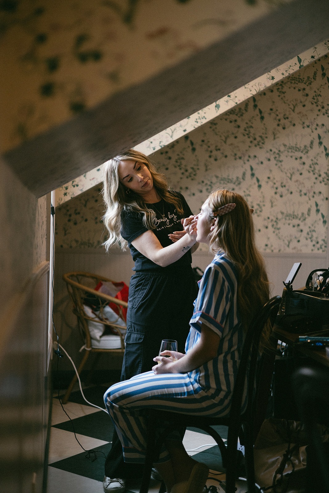 bridal makeup being done while getting ready for her wedding at the estelle in nashville