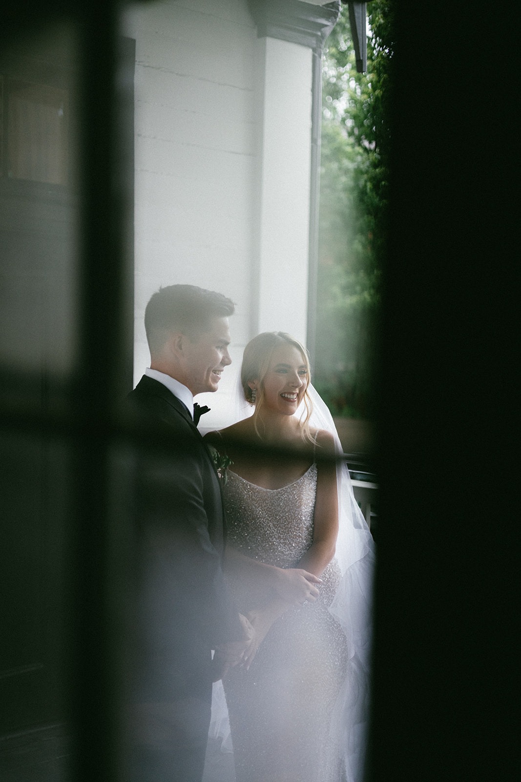 candid estelle nashville photo of a bride and groom sharing joy during their first look moment