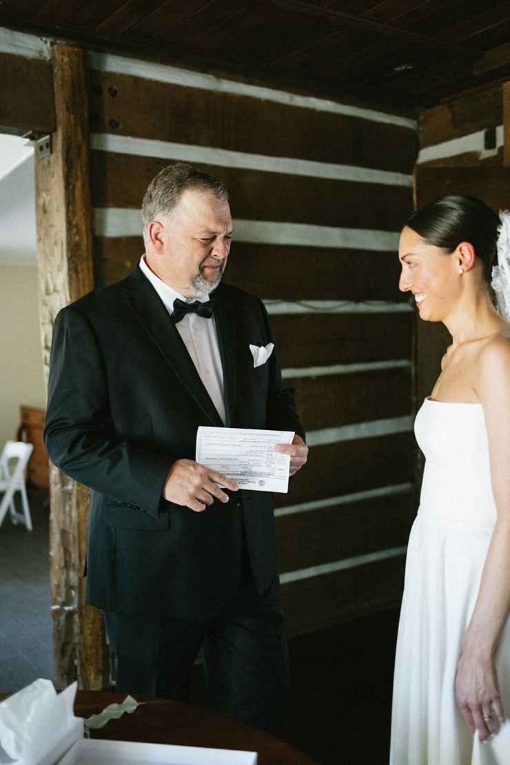 documentary style photography wedding photos of the brides first look with her dad