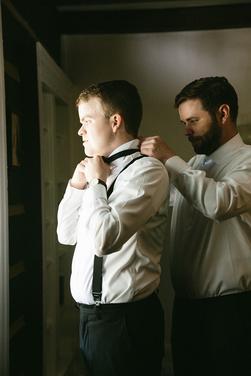 documentary style wedding photography photos of the groom getting ready
