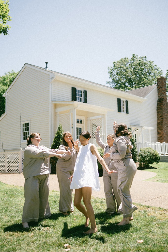 wedding photography documentary style of the bride with her bridesmaids