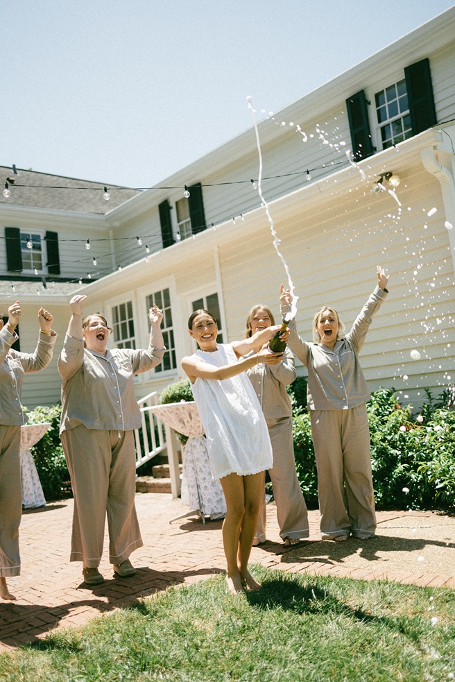 wedding photography documentary style of the bride with her bridesmaids